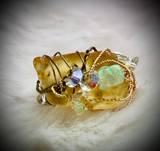Amber and Opal ring: ancient fire