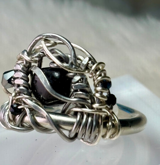 Black Onyx and Argentinian, silver ring:  commanding strength