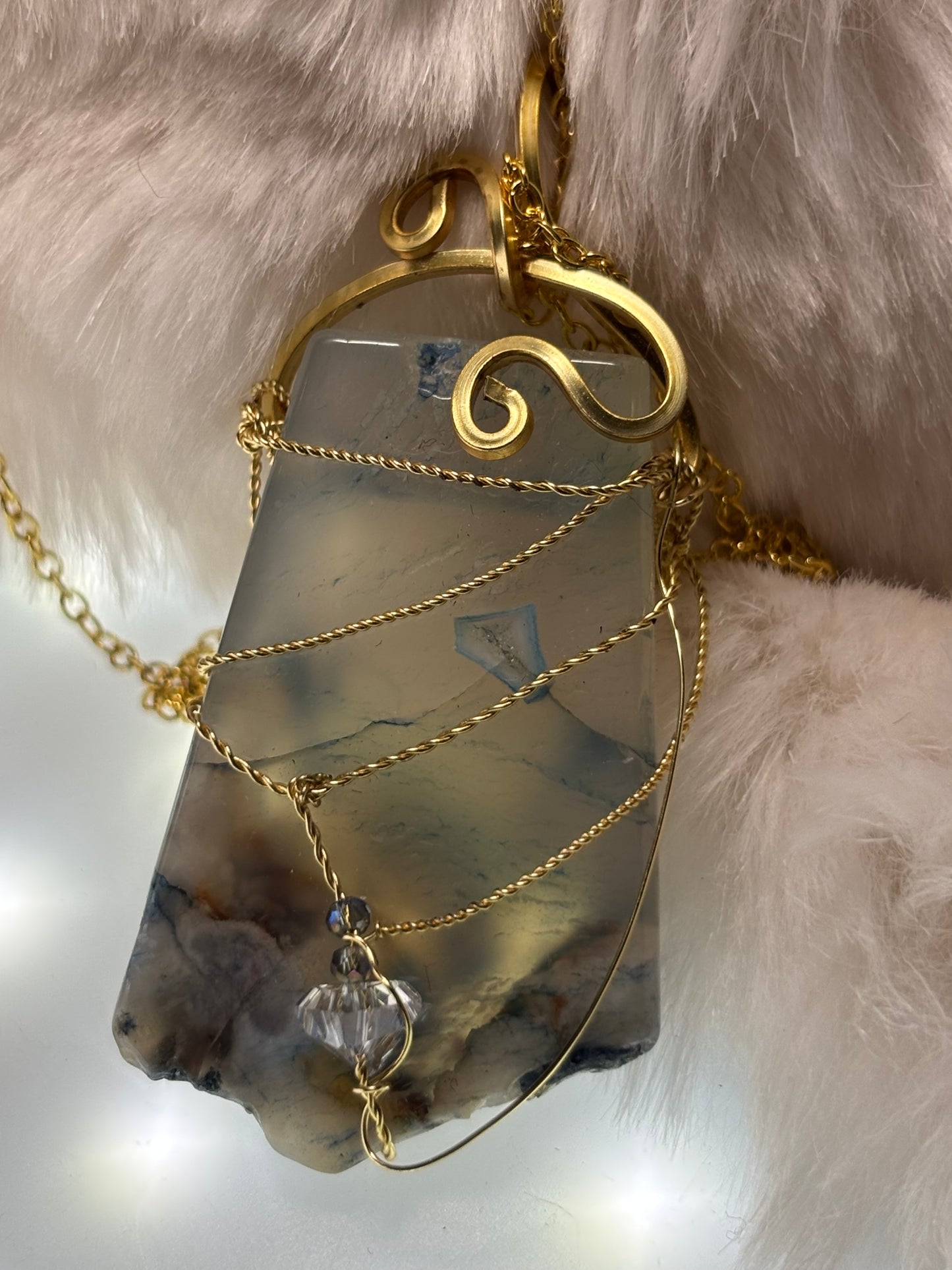 Sacred Shield of Madagascar Collection:

Guardian of the Blue- Rare Sea Agate pendant from Madagascar