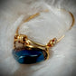 Blue strength: Aurora coated hematite in blue ring
