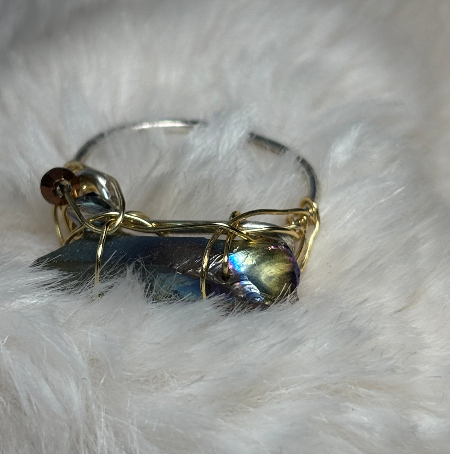 Celestial blade: Titanium Aura Quartz “ rainbow quartz”