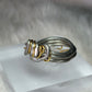 Silver and gold ring: ￼the circle