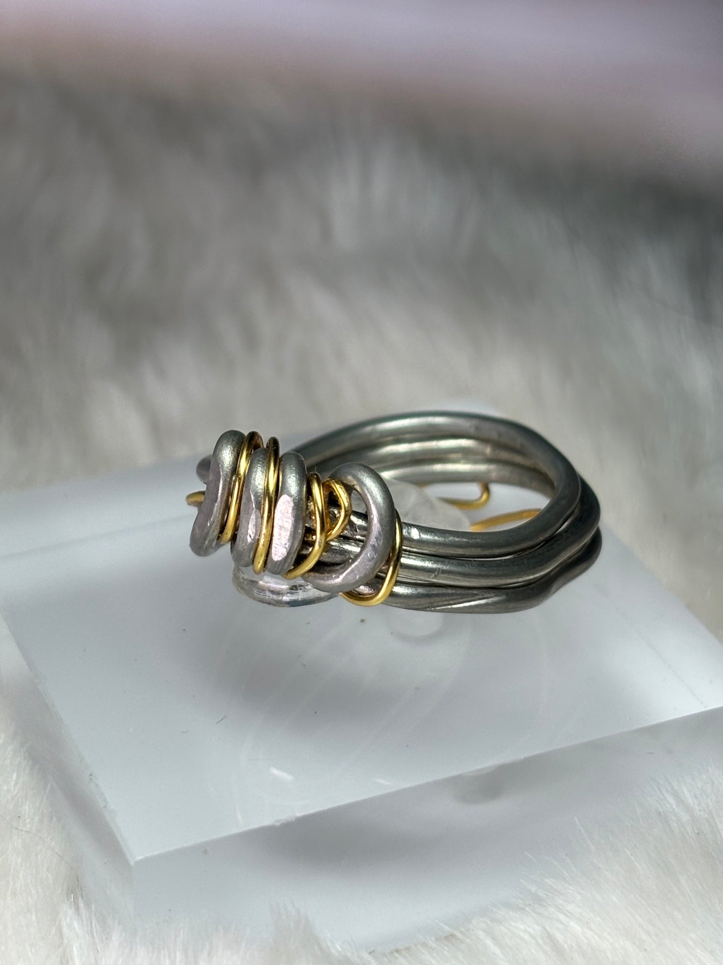 Silver and gold ring: ￼the circle