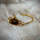 AURORA-COATED HEMATITE: in bronze and gold ring ￼
