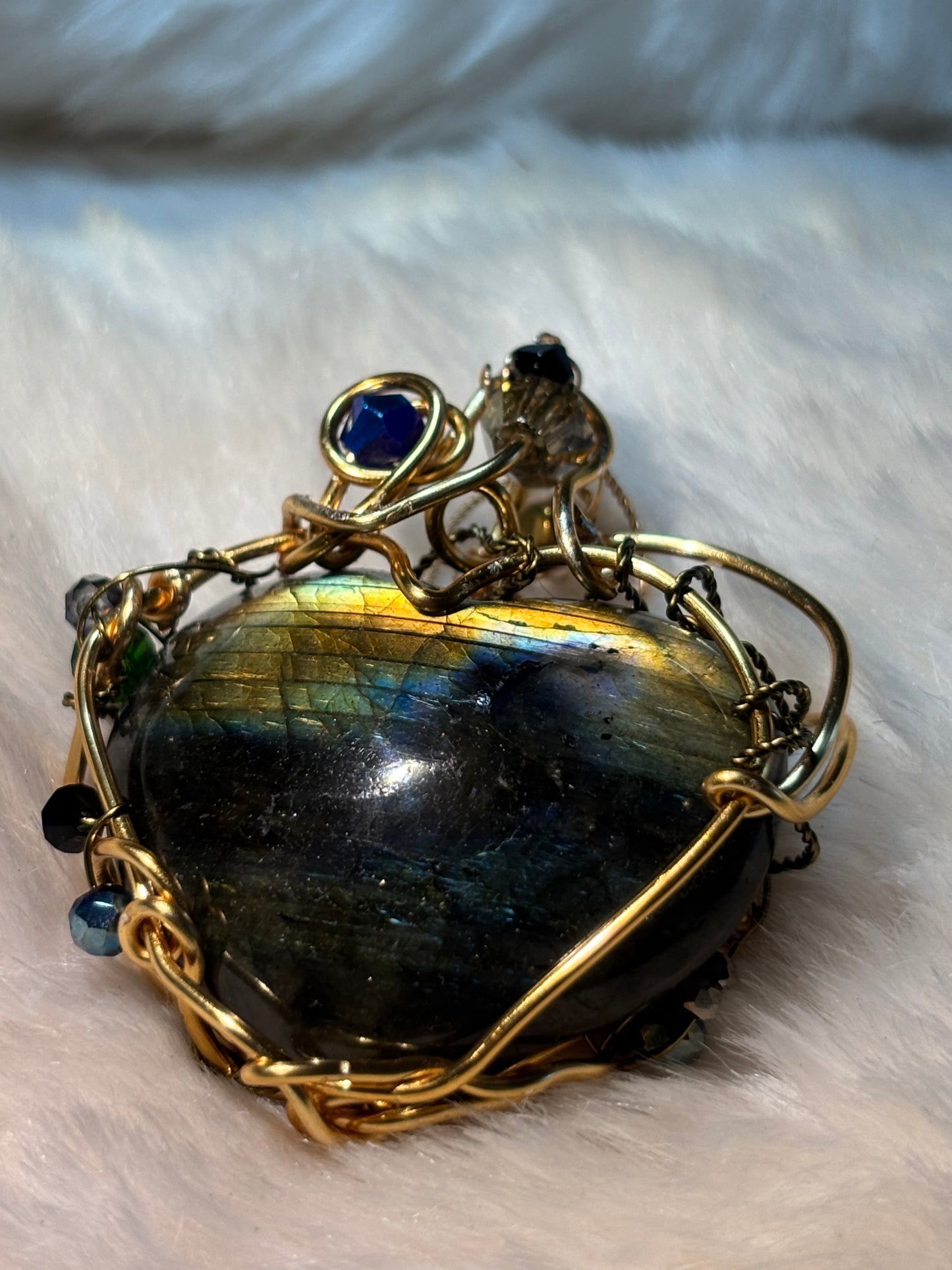 Labradorite heart necklace:


Heart of the Hidden Aurora