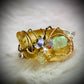 Amber and Opal ring: ancient fire