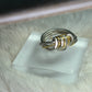 Silver and gold ring: ￼the circle