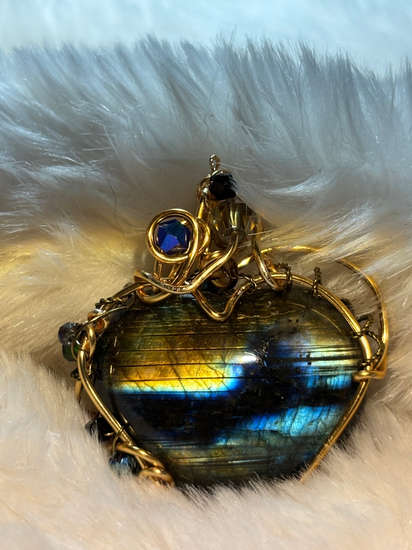 Labradorite heart necklace:


Heart of the Hidden Aurora