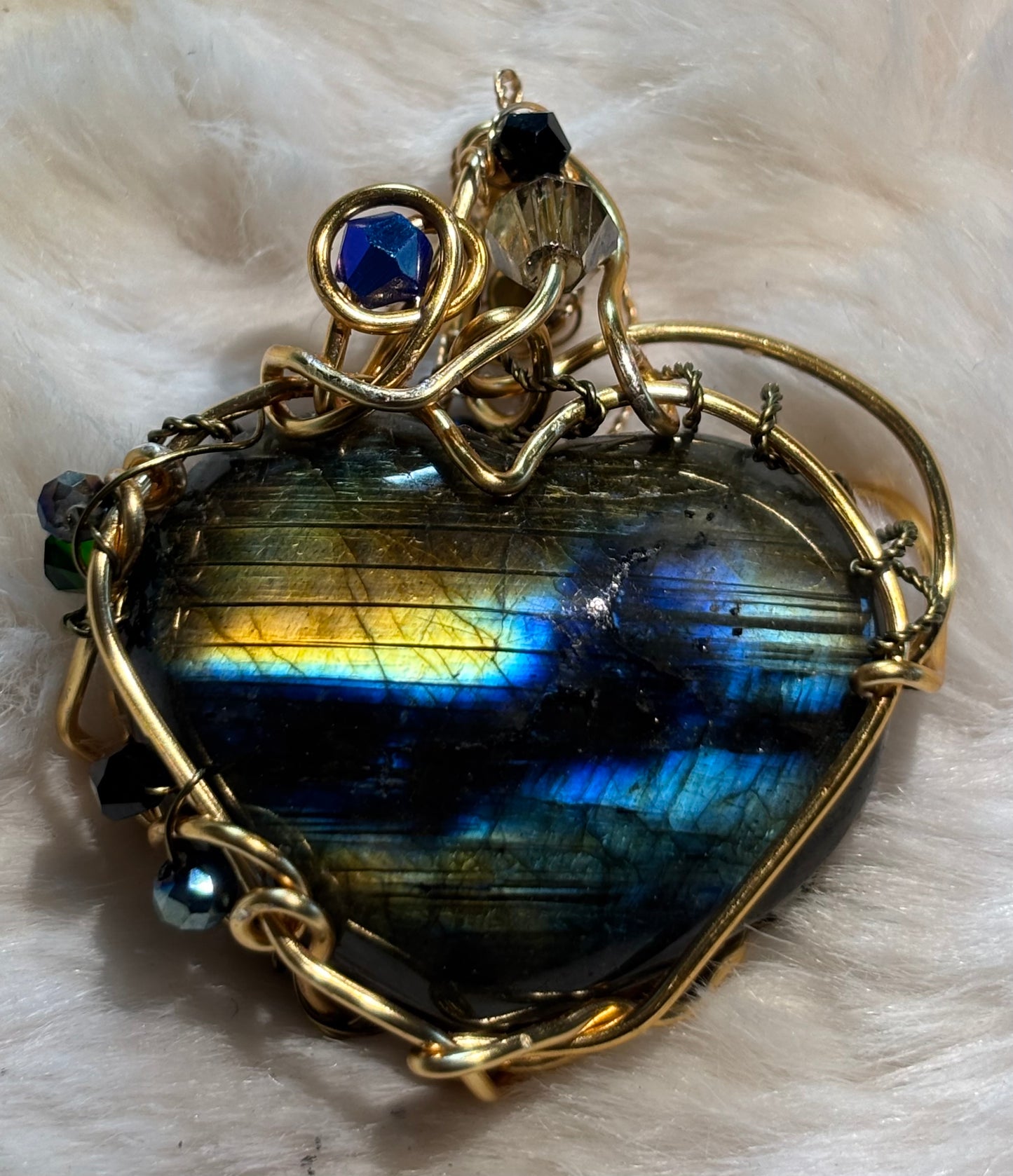Labradorite heart necklace:


Heart of the Hidden Aurora