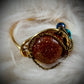 Gold stone, and turquoise ring