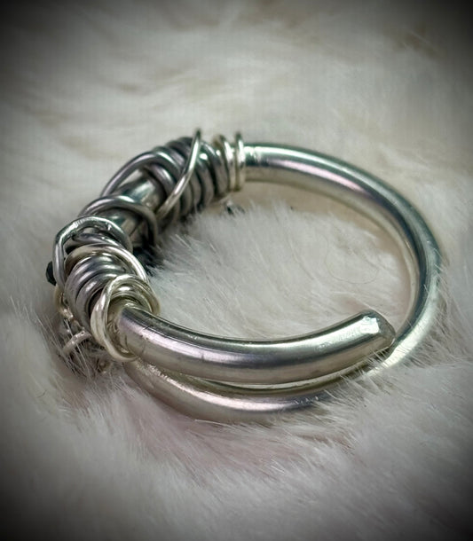 Black Onyx and Argentinian, silver ring: ￼ commanding strength