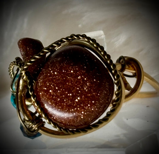 Gold stone, and turquoise ring