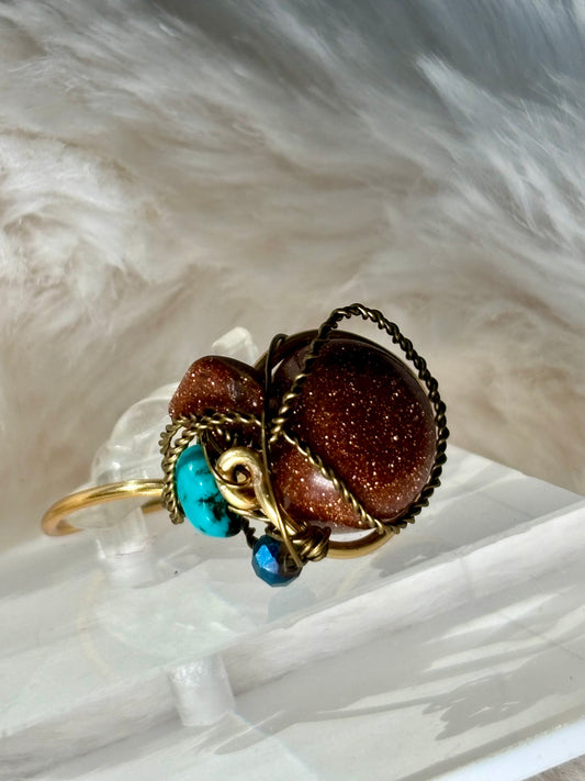 Gold stone, and turquoise ring