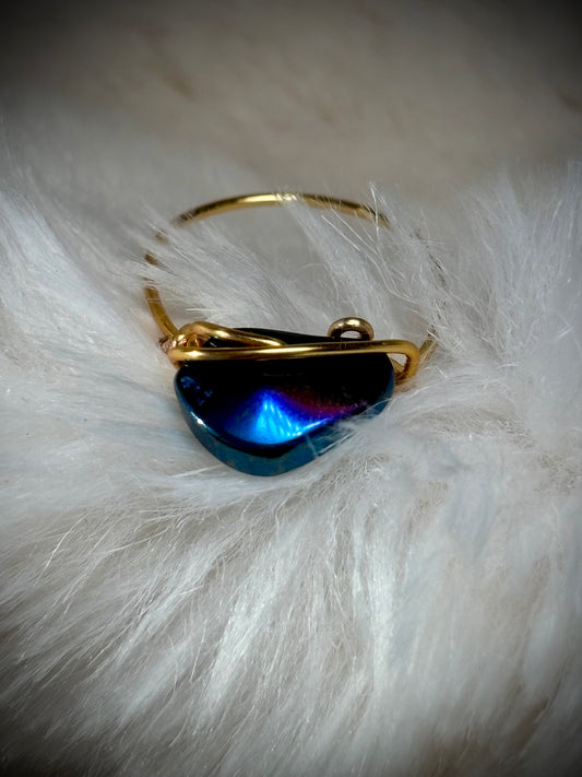 Blue strength: Aurora coated hematite in blue ring