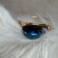 Blue strength: Aurora coated hematite in blue ring