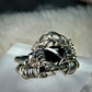 Black Onyx and Argentinian, silver ring: ￼ commanding strength