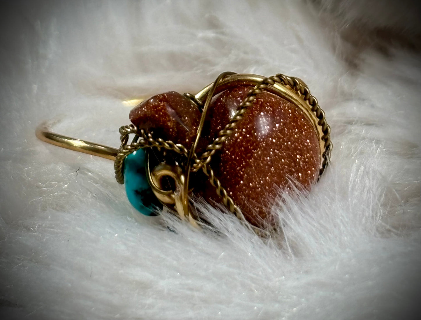 Gold stone, and turquoise ring