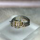 Silver and gold ring: ￼the circle