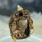 Topaz ring: ￼Gatsby’s Daisy ￼
