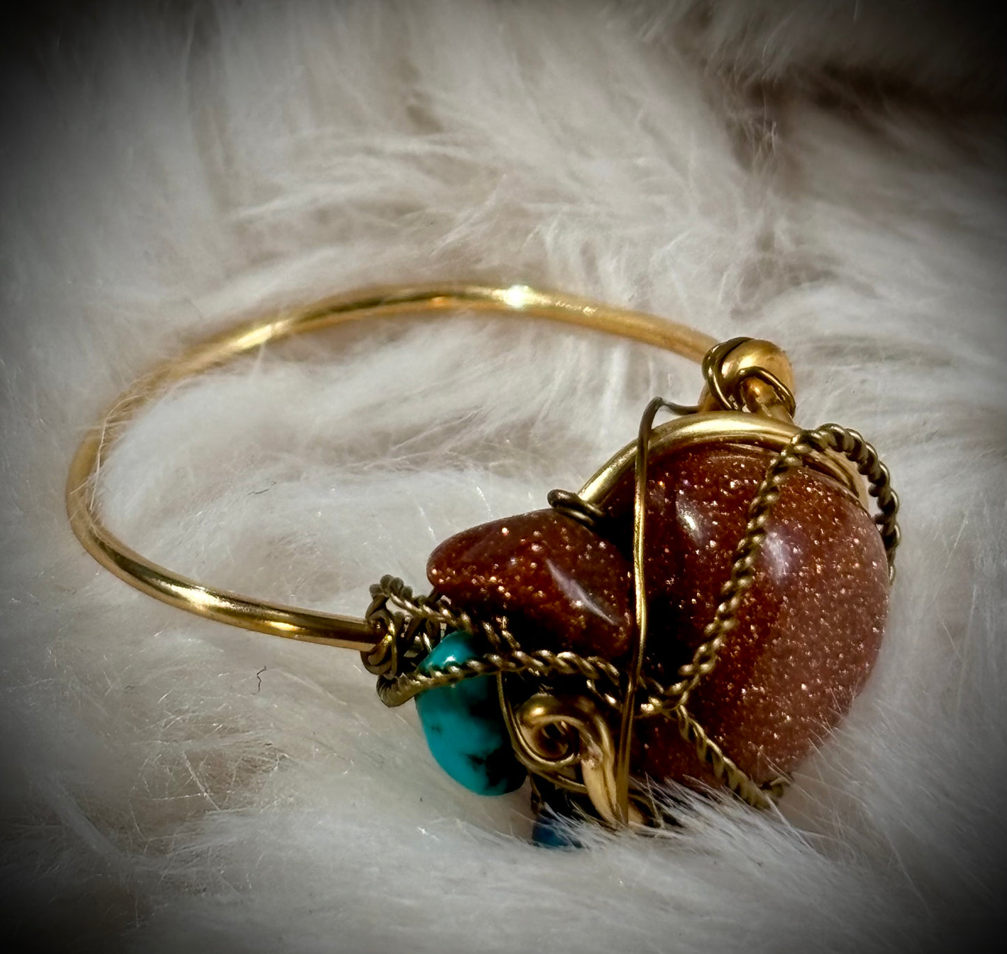 Gold stone, and turquoise ring