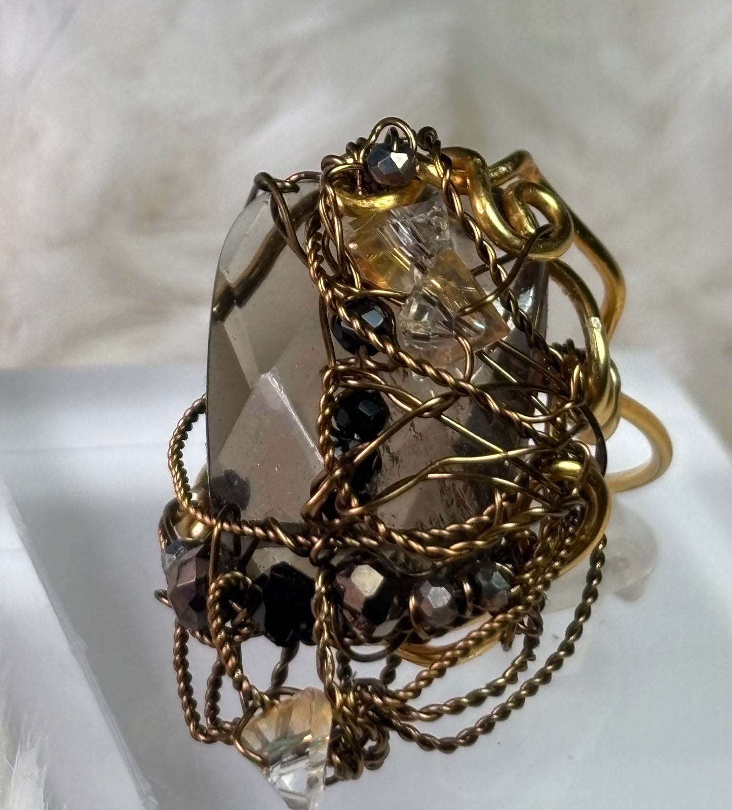 Topaz ring: ￼Gatsby’s Daisy ￼