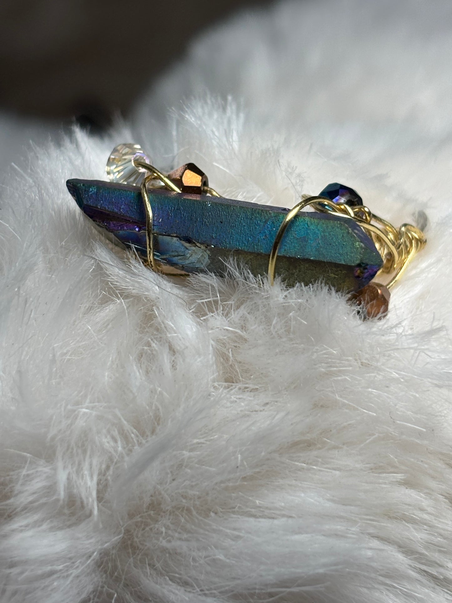 Celestial blade: Titanium Aura Quartz “ rainbow quartz”
