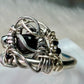 Black Onyx and Argentinian, silver ring: ￼ commanding strength