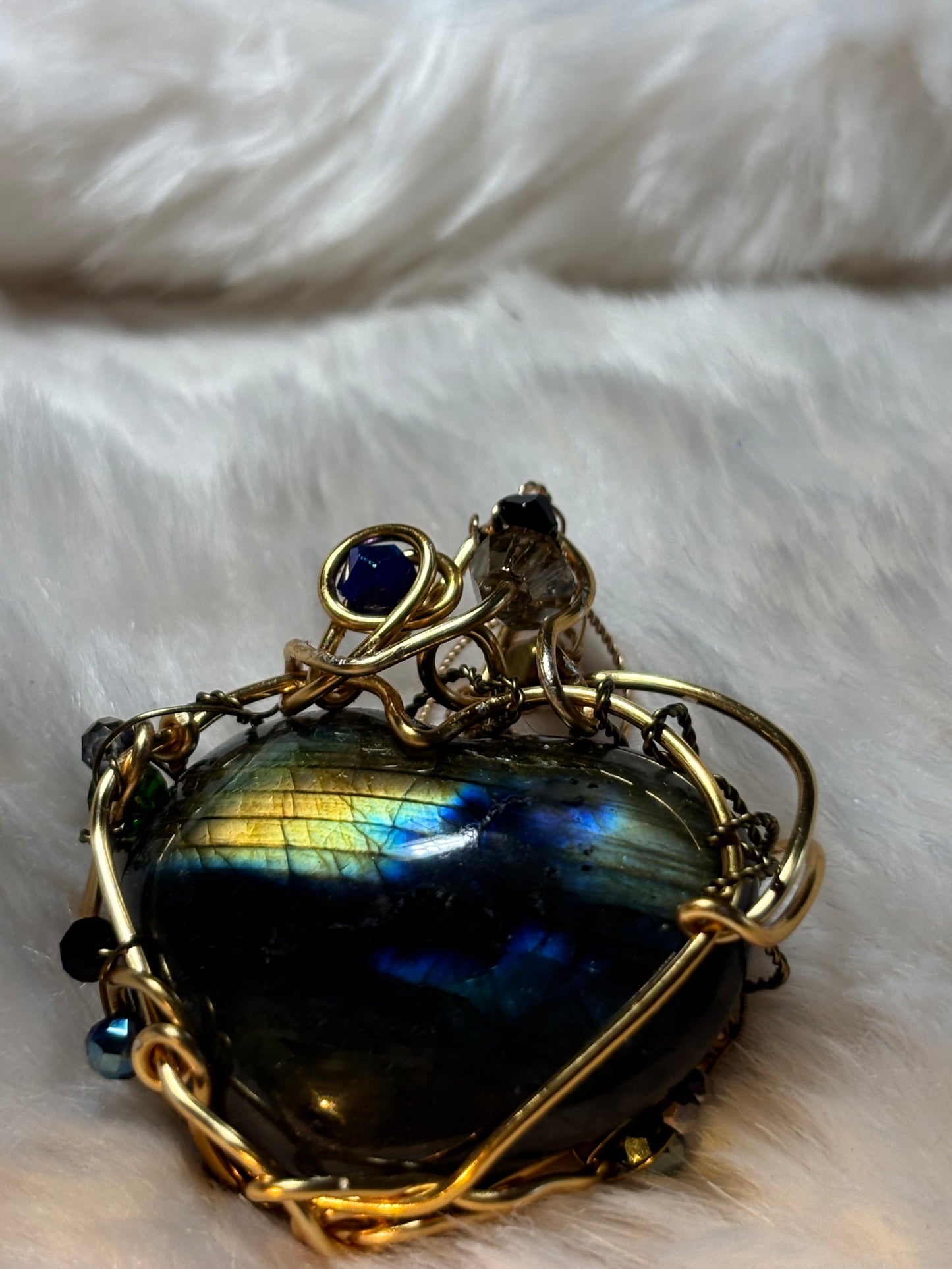 Labradorite heart necklace:


Heart of the Hidden Aurora