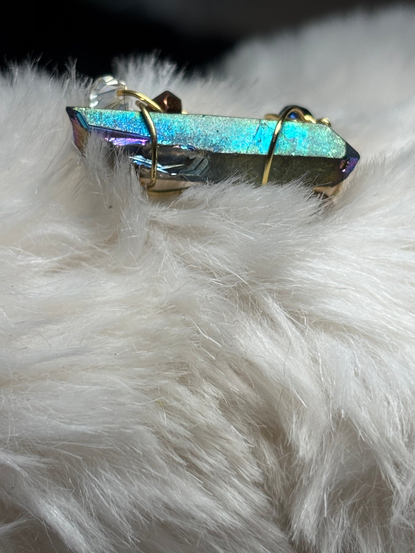 Celestial blade: Titanium Aura Quartz “ rainbow quartz”